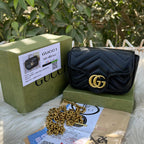 Gucci GG Marmont black matelassé chevron leather mini bag