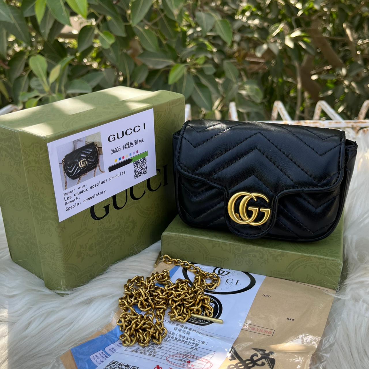 Gucci GG Marmont black matelassé chevron leather mini bag