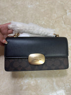 Coach Eliza Flap Crossbody bag in signature canvas