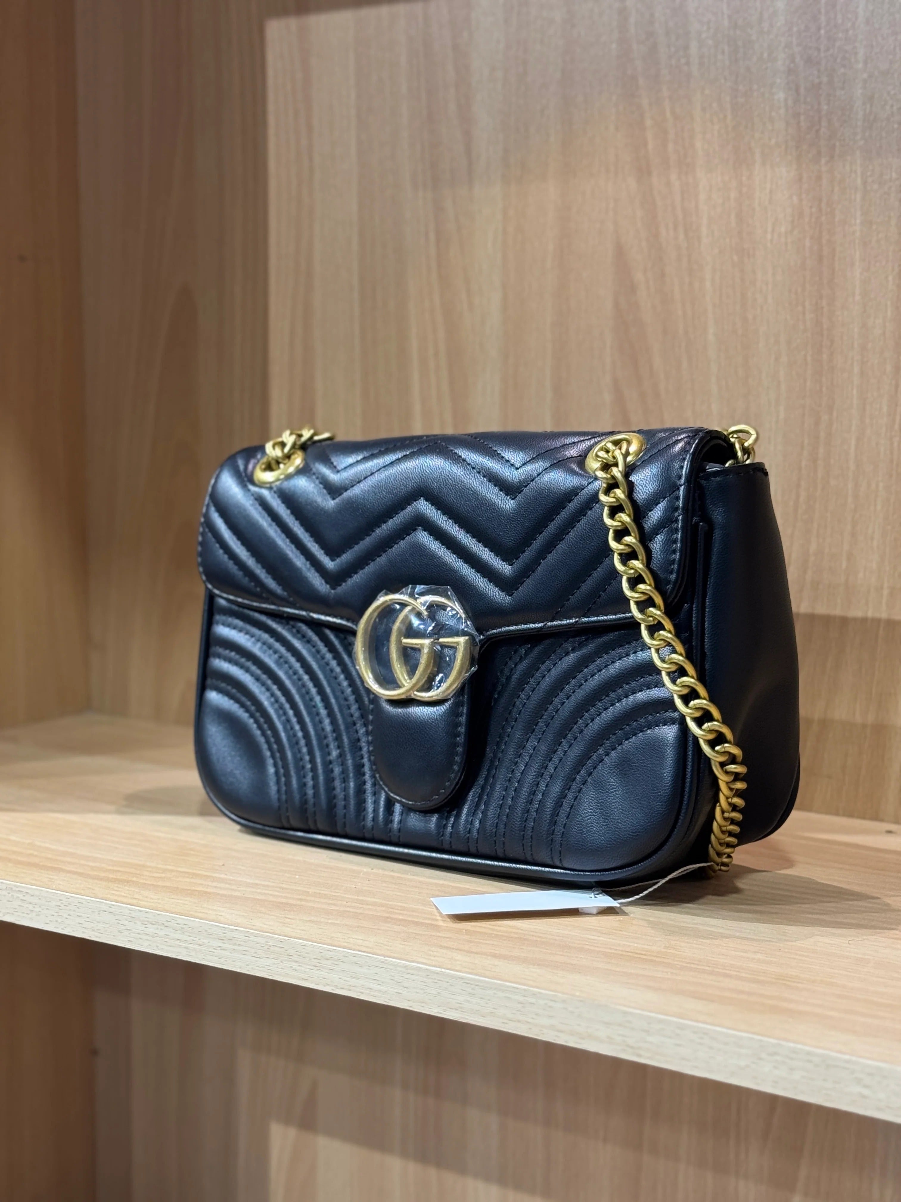 Gucci GG Marmont black matelassé chevron leather mini bag